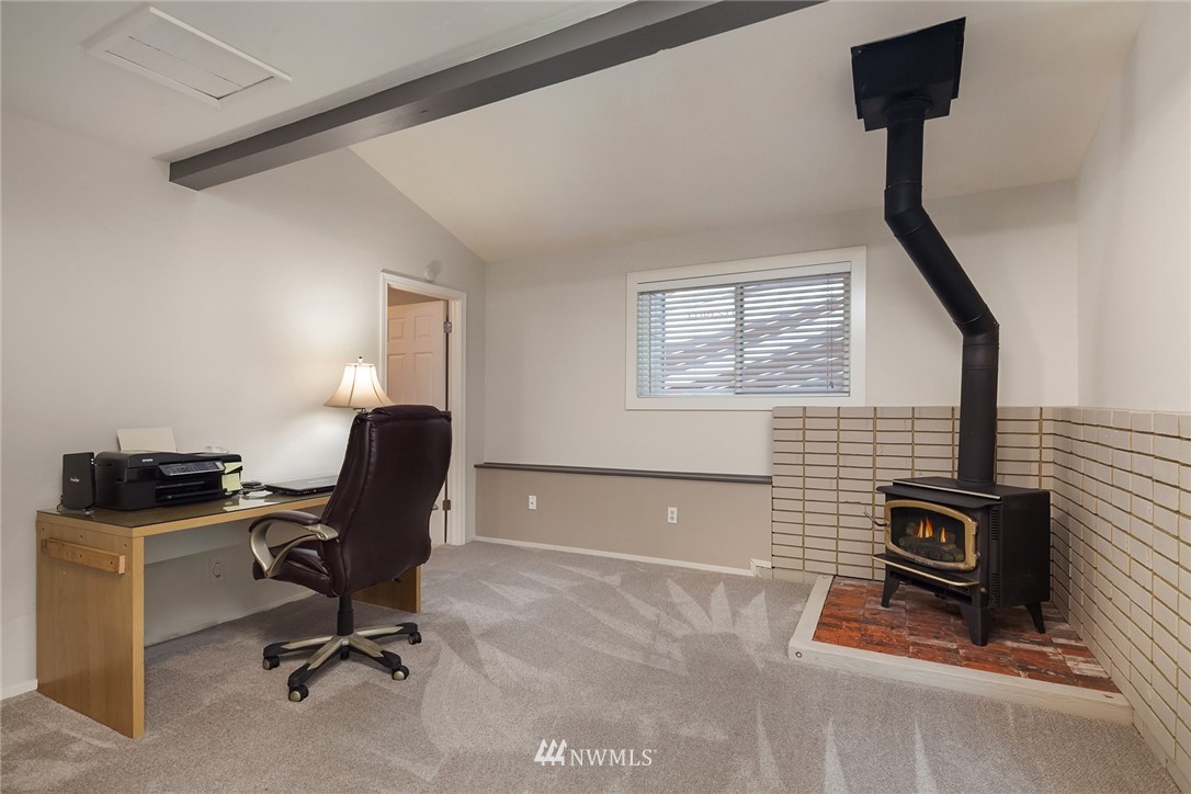22303 49th Avenue Southeast Bothell, WA 98021 - Photo 18 of 25 a view of a workspace with furniture and a window