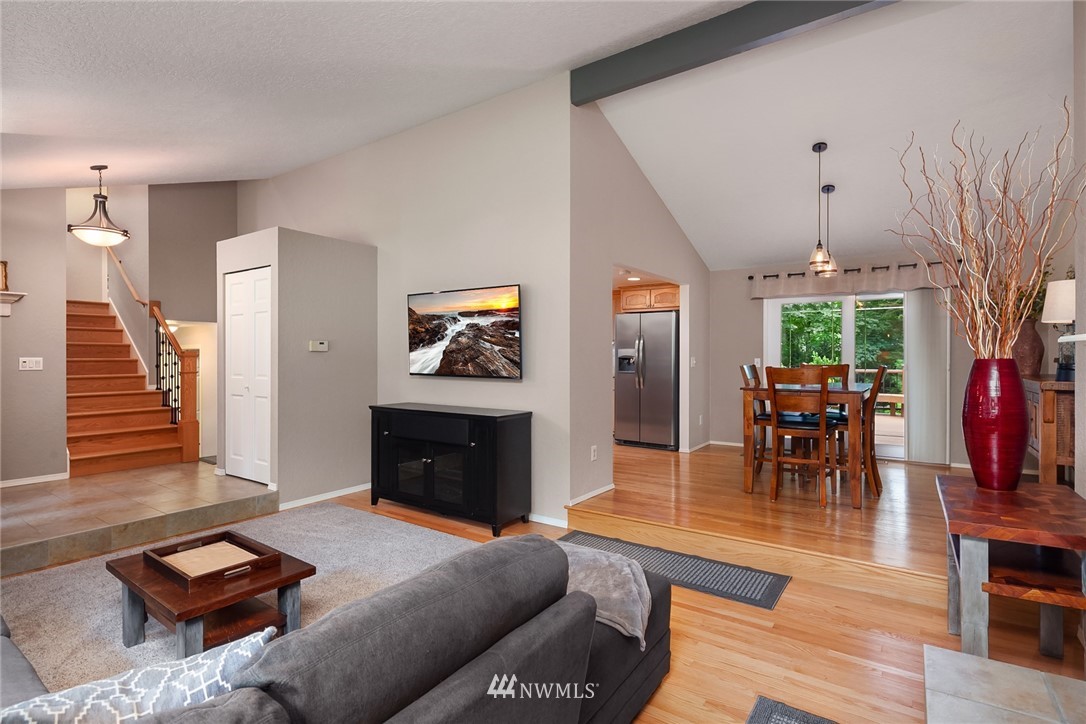 22303 49th Avenue Southeast Bothell, WA 98021 - Photo 6 of 25 a living room with furniture and a fireplace
