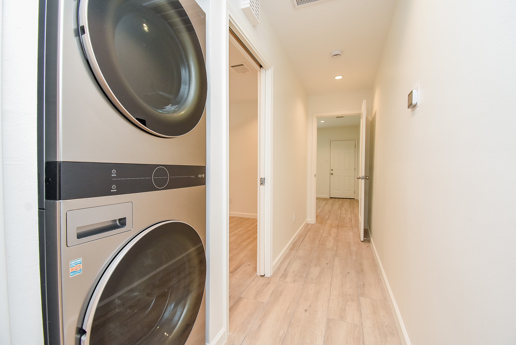 2509 Terry Street, Unit A Houston, TX 77009 - Photo 18 of 22 a view of a hallway with washer and dryer