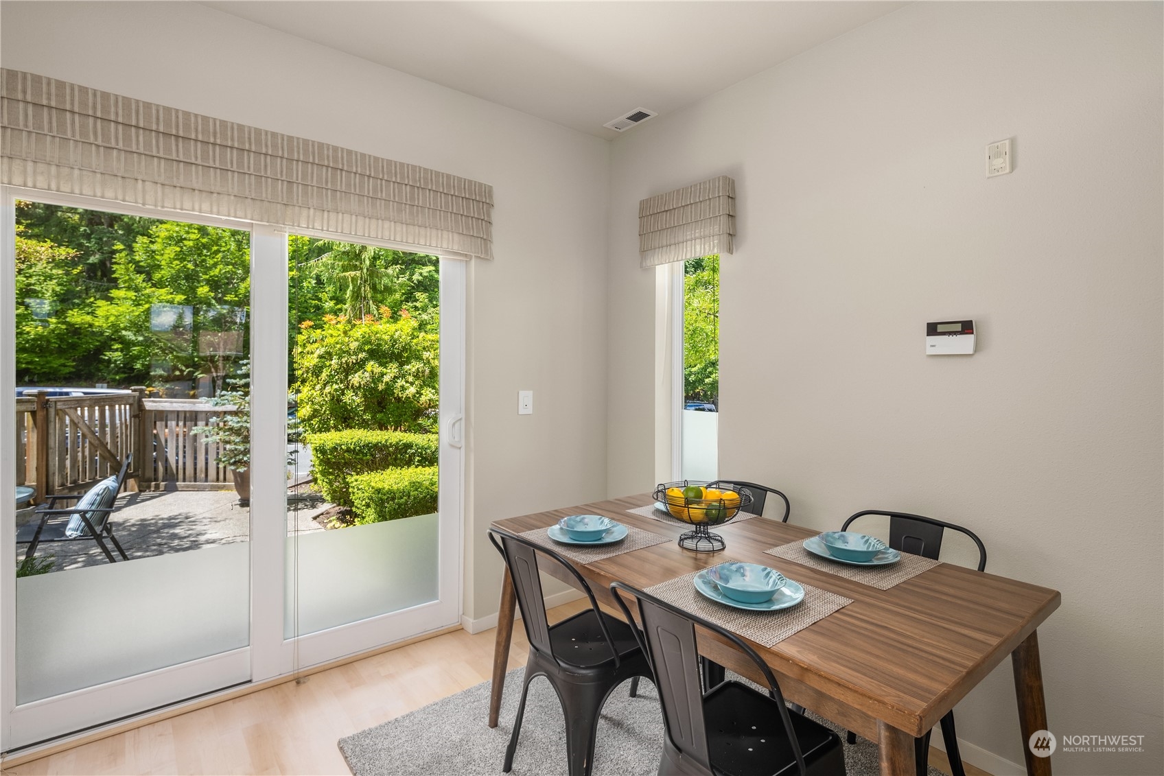 145 Sky Ridge Road Northwest Issaquah, WA 98027 - Photo 13 of 36 a view of a dining room with furniture window and outside view