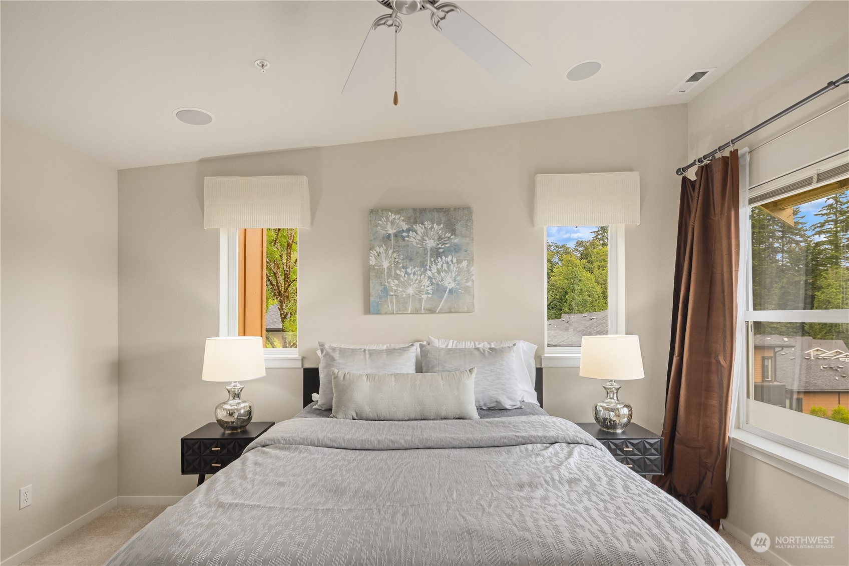 145 Sky Ridge Road Northwest Issaquah, WA 98027 - Photo 20 of 36 a bedroom with a large bed and a window