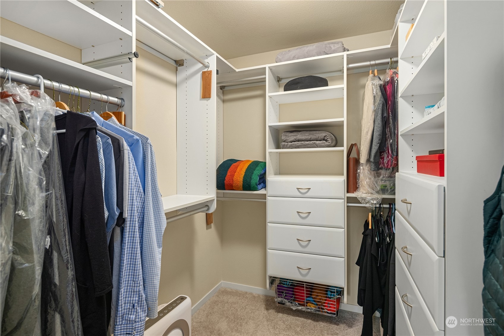 145 Sky Ridge Road Northwest Issaquah, WA 98027 - Photo 22 of 36 a view of walk in closet with clothes and shoes