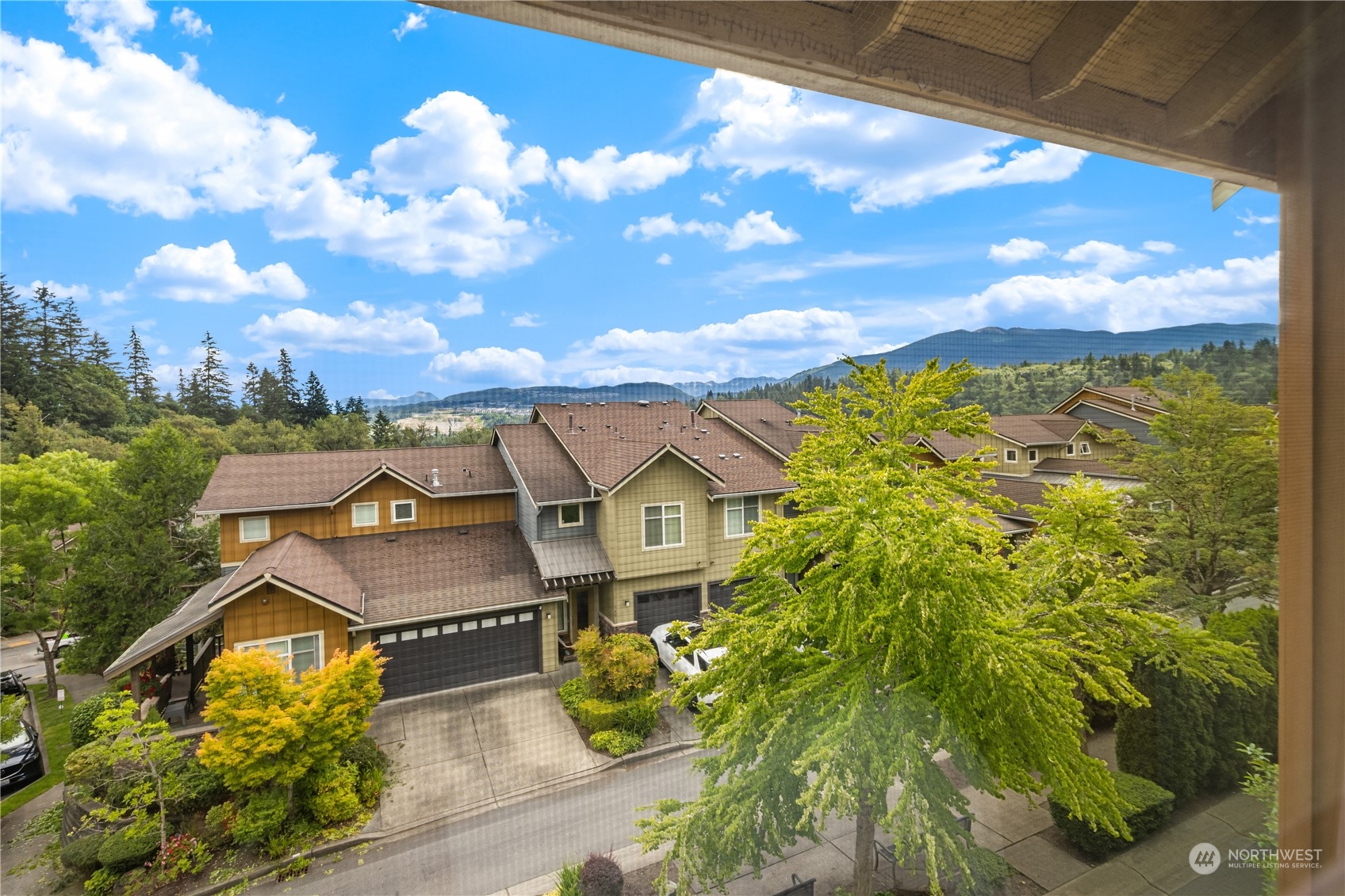 145 Sky Ridge Road Northwest Issaquah, WA 98027 - Photo 23 of 36 a view of a house with a yard