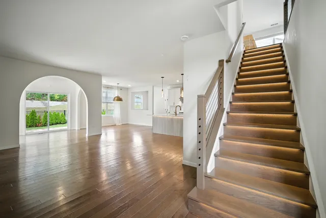 a view of entryway with wooden floor