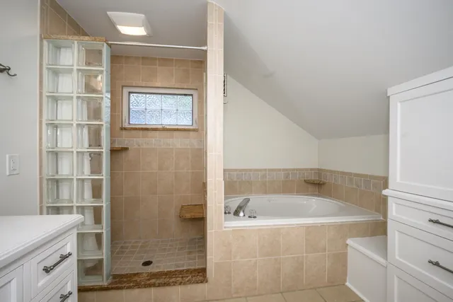 a view of a room that has a window in it