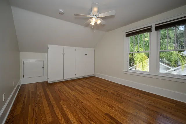 a view of a house with backyard porch and sitting area