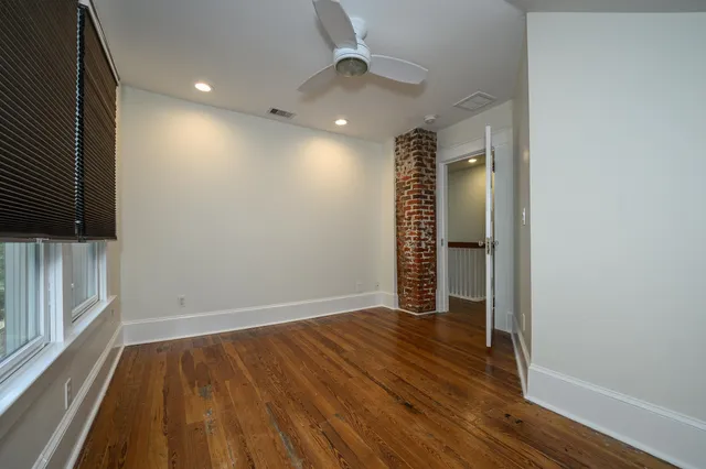 a view of empty room with windows