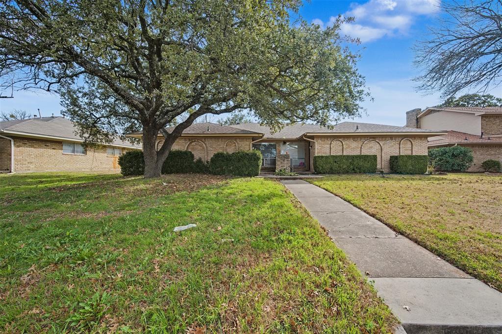 2302 18th Street Plano, TX 75074 - Photo 1 of 31 a view of a house with a yard