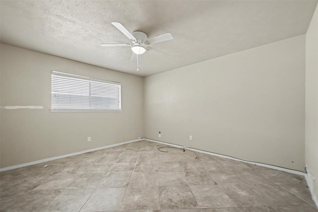 2302 18th Street Plano, TX 75074 - Photo 19 of 31 a view of an empty room with a window