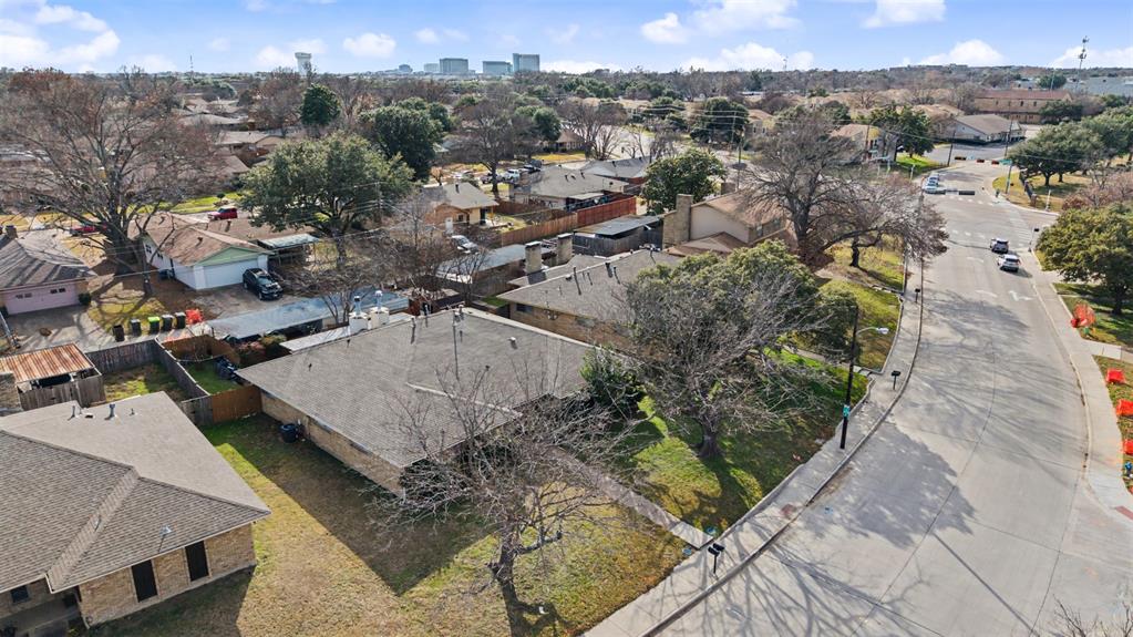 2302 18th Street Plano, TX 75074 - Photo 25 of 31 a view of a houses with a yard
