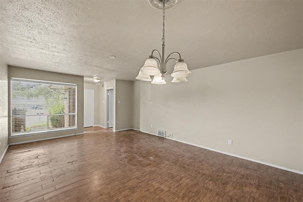 2302 18th Street Plano, TX 75074 - Photo 8 of 31 a view of an empty room with a window