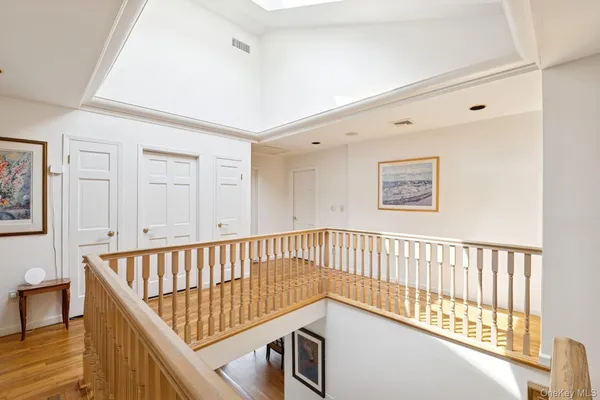 a view of a hallway with windows