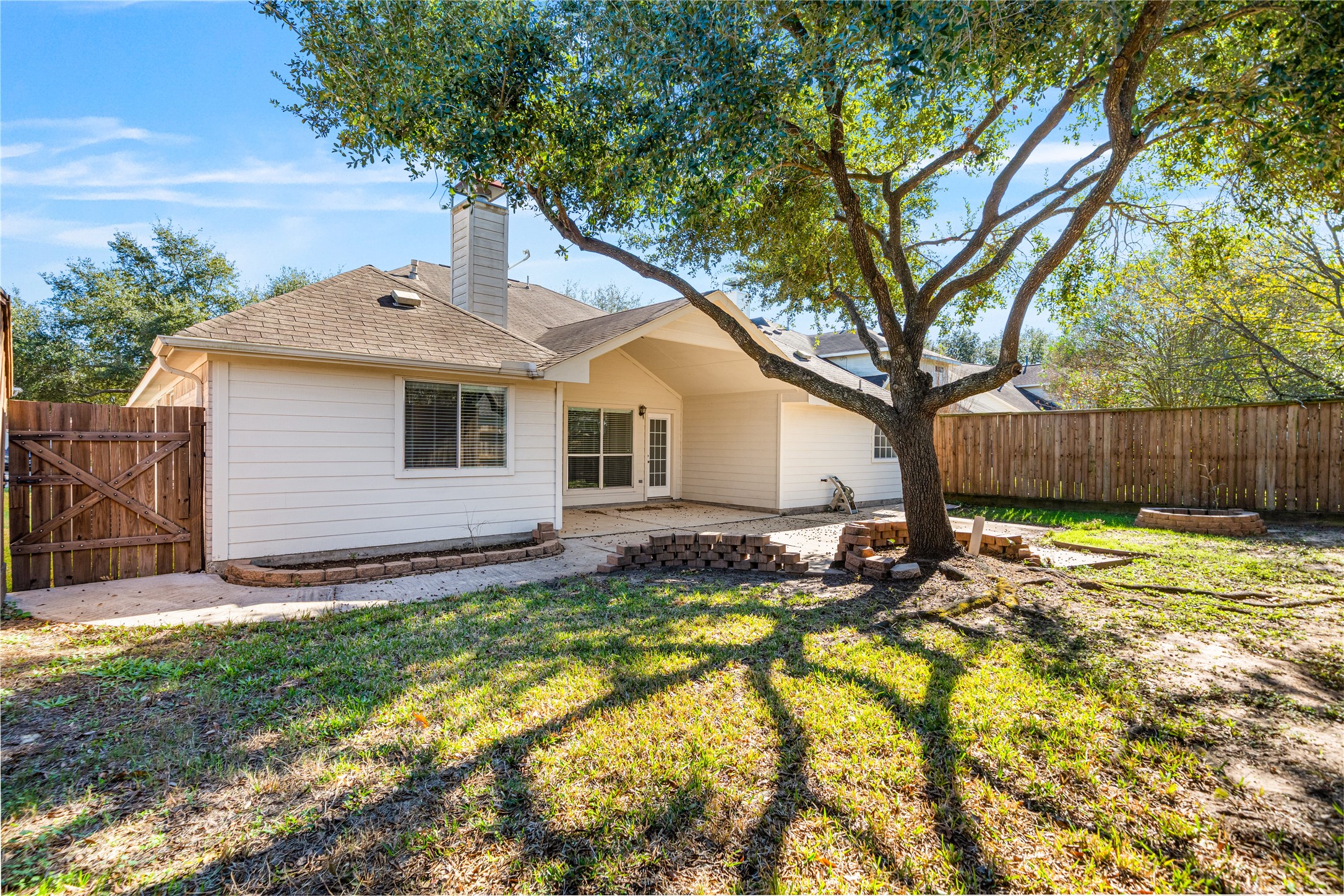 3623 Sage Pointe Court Katy, TX 77449 - Photo 29 of 32 a view of a house with backyard and a tree