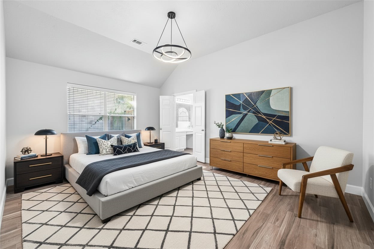 3623 Sage Pointe Court Katy, TX 77449 - Photo 4 of 32 a bedroom with a bed and a dresser