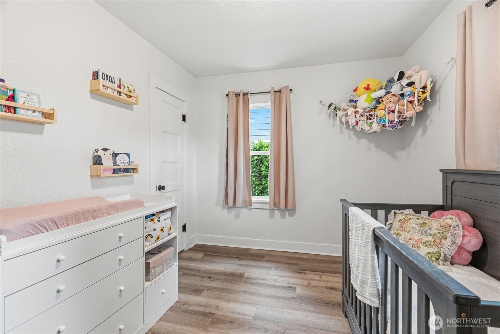 2828 Fir Street Longview, WA 98632 - Photo 13 of 18 a bedroom with a bed and a window