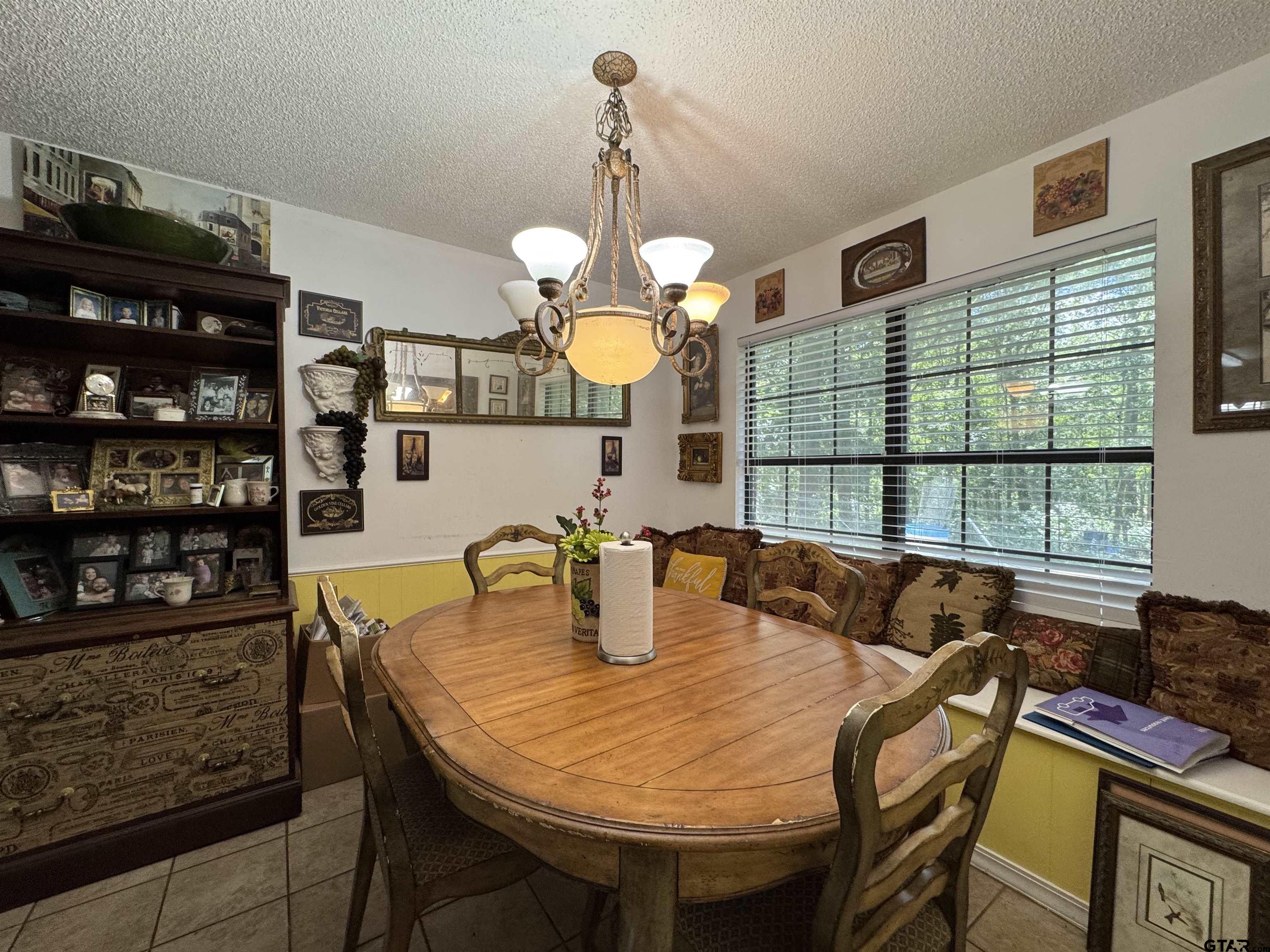 4159 Scrub Pine Road Gilmer, TX 75645 - Photo 27 of 39 a dining room with furniture and window