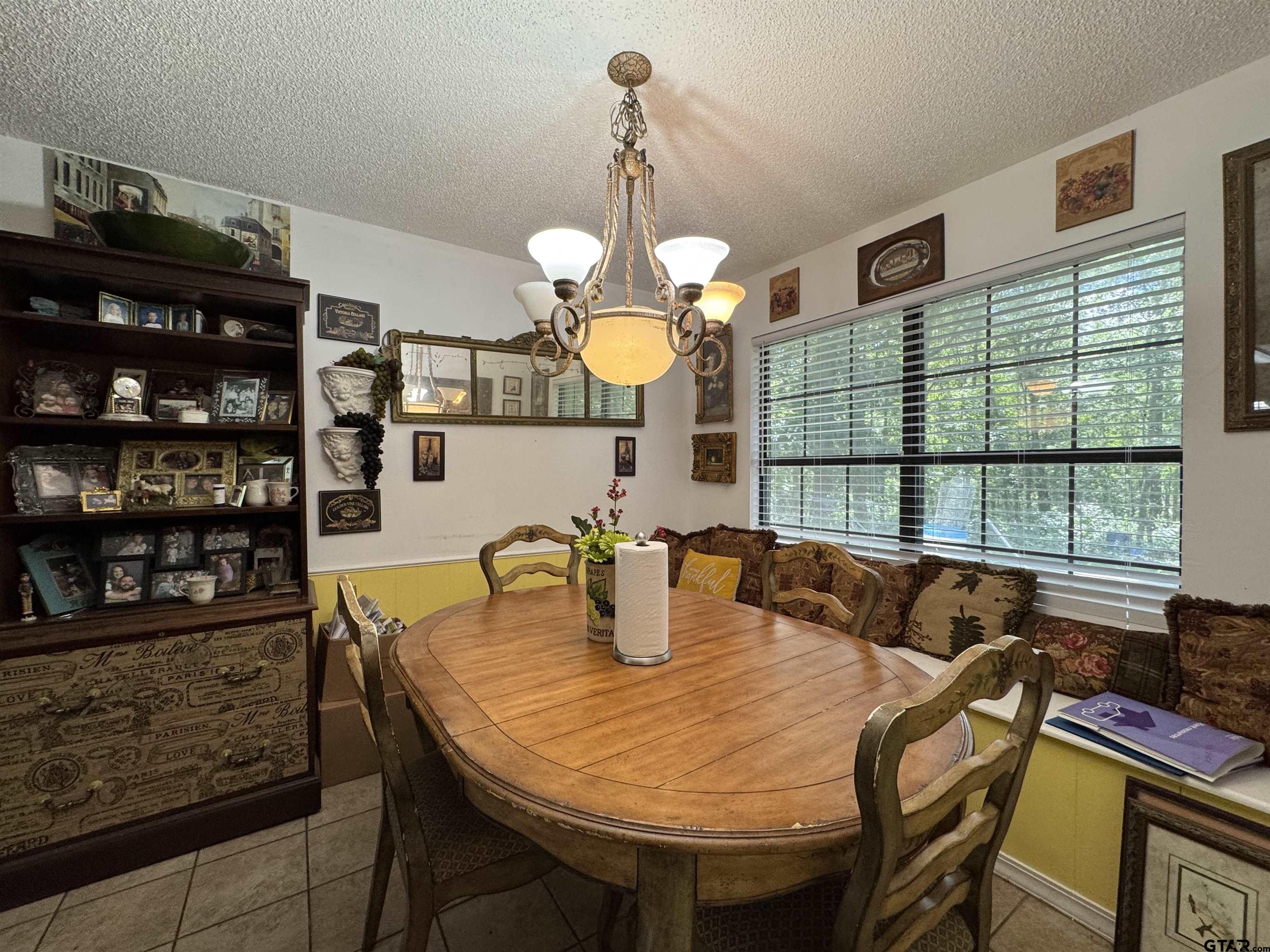 4159 Scrub Pine Road Gilmer, TX 75645 - Photo 28 of 39 a kitchen with a table and chairs