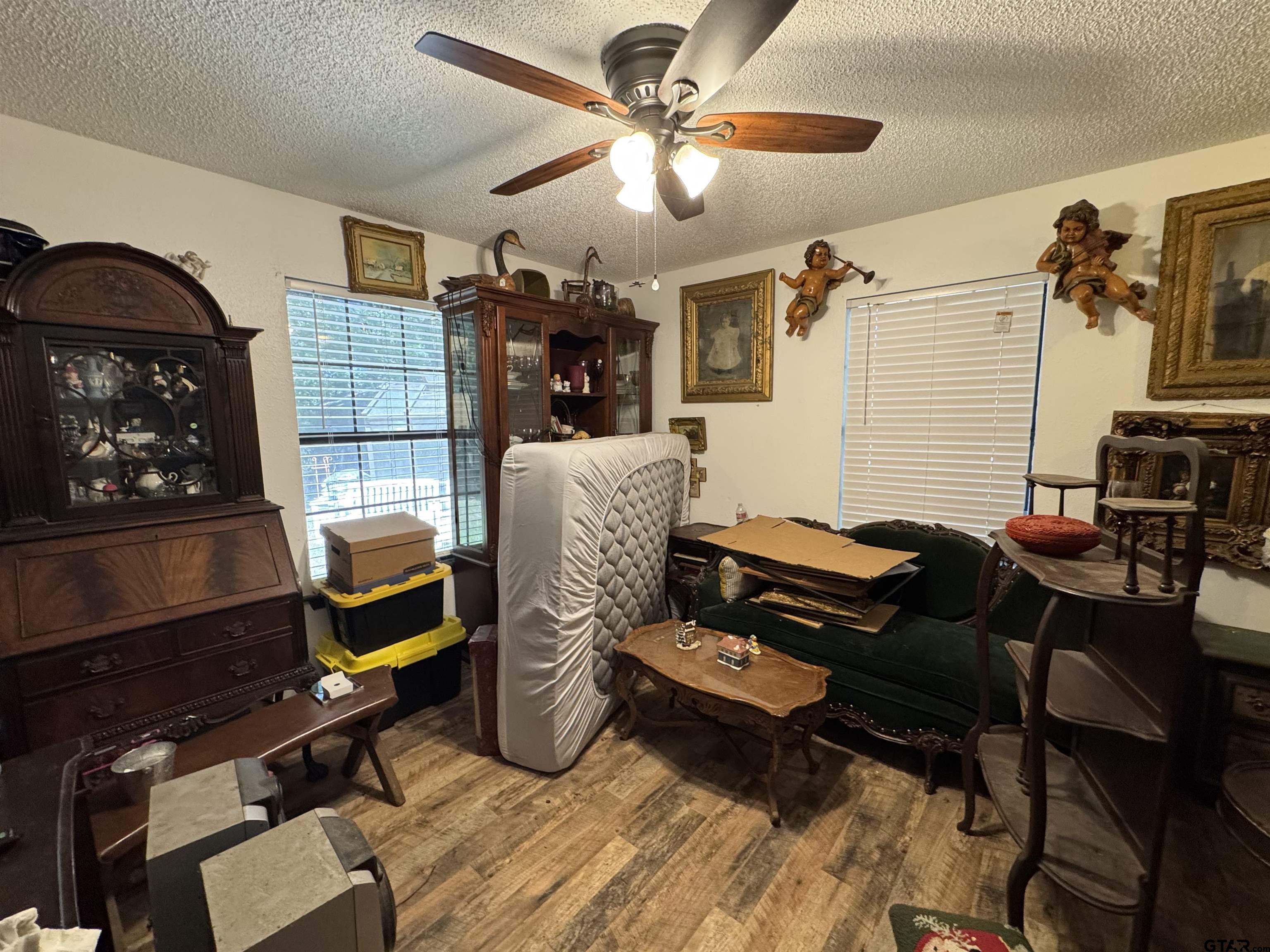 4159 Scrub Pine Road Gilmer, TX 75645 - Photo 32 of 39 a bedroom with furniture and a window