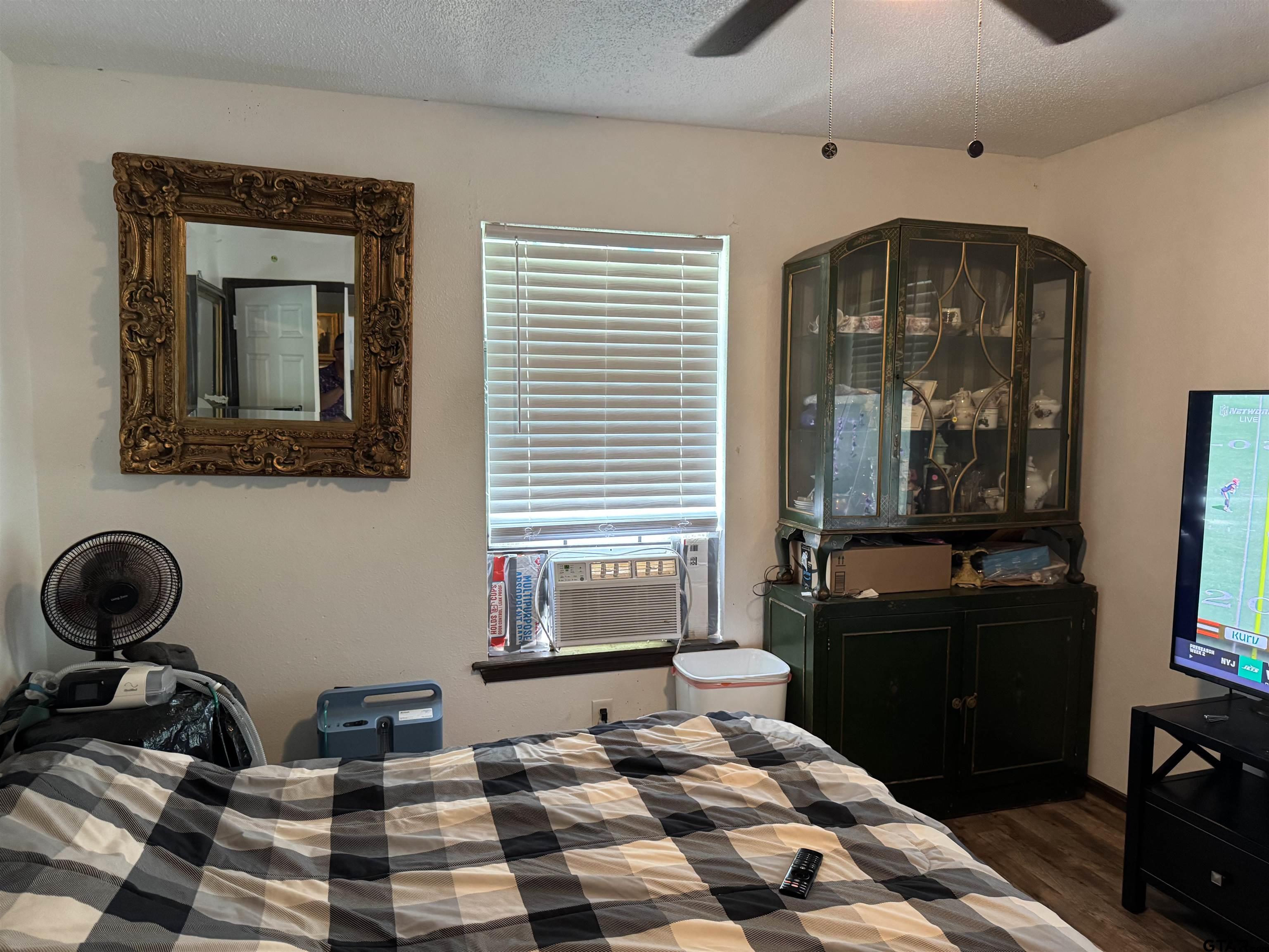 4159 Scrub Pine Road Gilmer, TX 75645 - Photo 37 of 39 a bedroom with furniture and a window