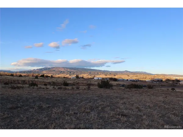 a view of an outdoor space and mountain view