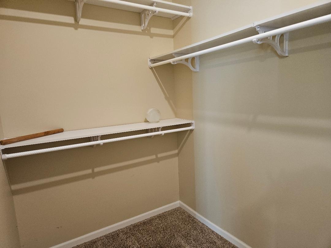 555 Paint Creek Road, Unit C McDade, TX 78650 - Photo 13 of 26 a view of a room with racks on the wall