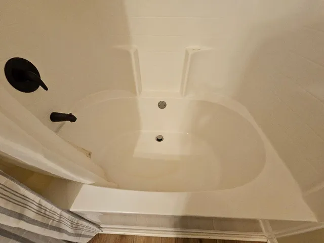 a bathroom with a bathtub