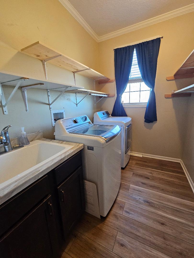555 Paint Creek Road, Unit C McDade, TX 78650 - Photo 18 of 26 a utility room with washer and dryer