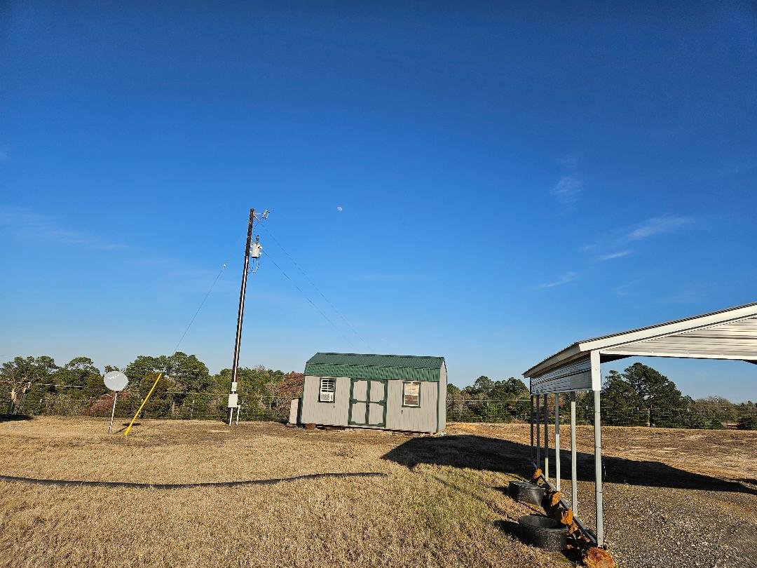 555 Paint Creek Road, Unit C McDade, TX 78650 - Photo 23 of 26 a view of a terrace with a view of living room