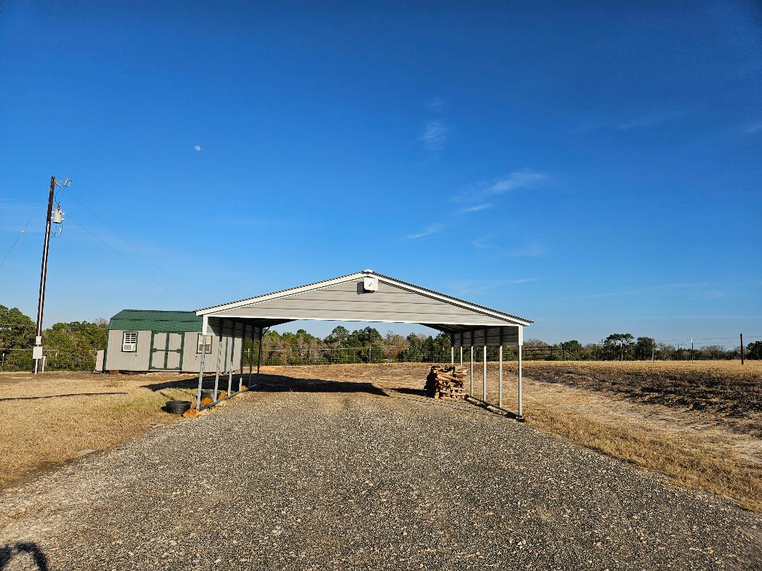 555 Paint Creek Road, Unit C McDade, TX 78650 - Photo 24 of 26 a front view of a house with a yard