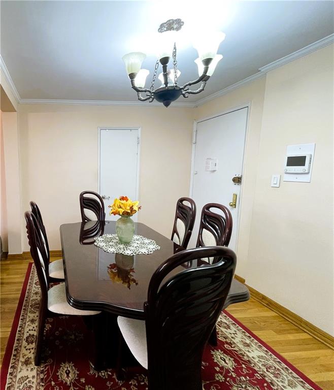 2711 Avenue X, Unit 6J Brooklyn, NY 11235 - Photo 7 of 24 a close view of a sink a faucet and a chandelier