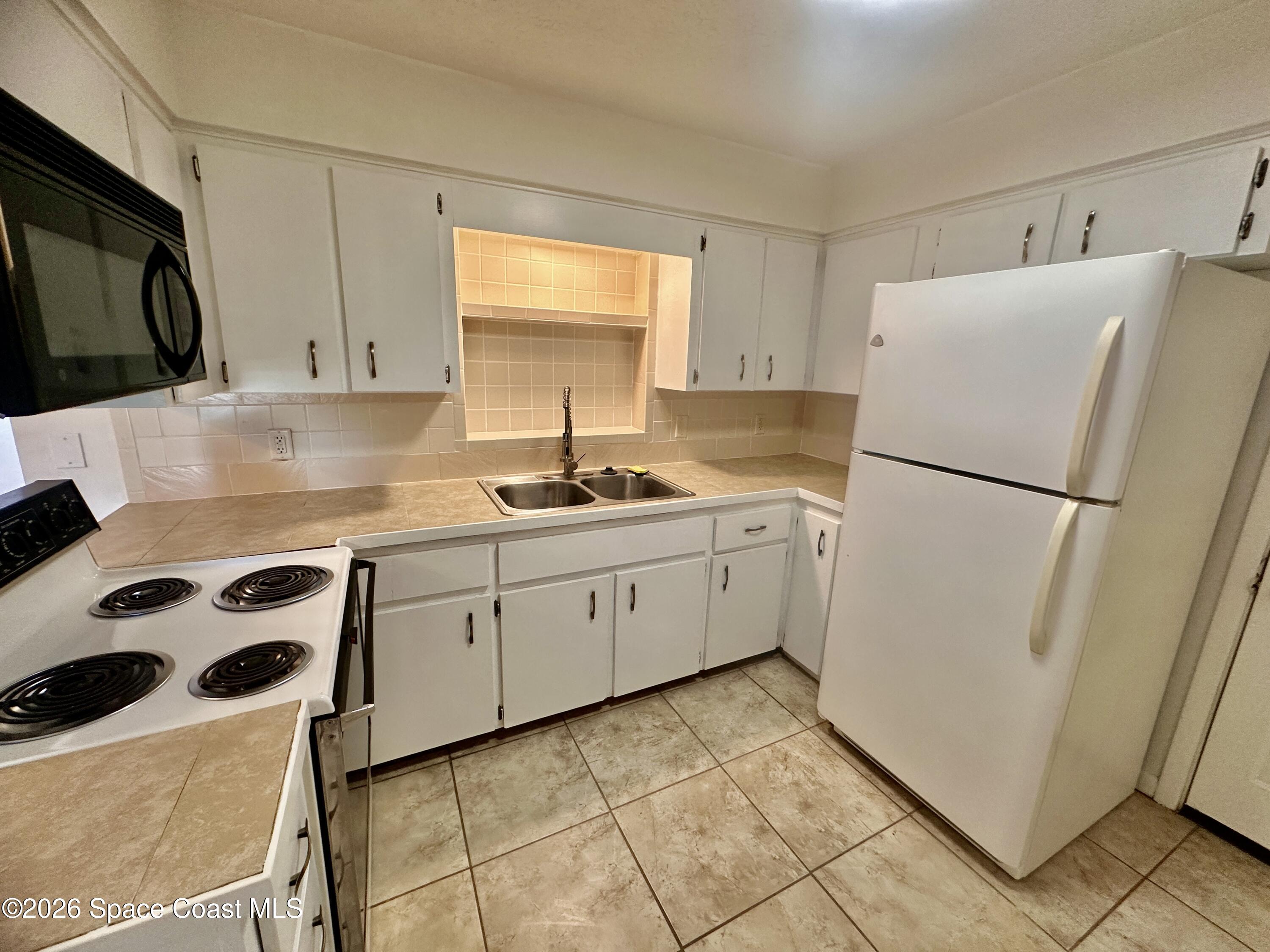 2946 Matthew Drive Rockledge, FL 32955 - Photo 3 of 19 IMG_E4862