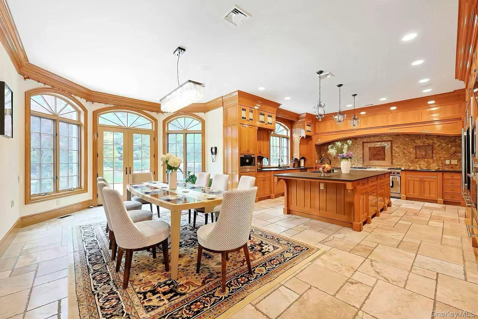 11 Black Rock Road Muttontown, NY 11545 - Photo 14 of 45 a view of a dining room with furniture large windows and wooden floor