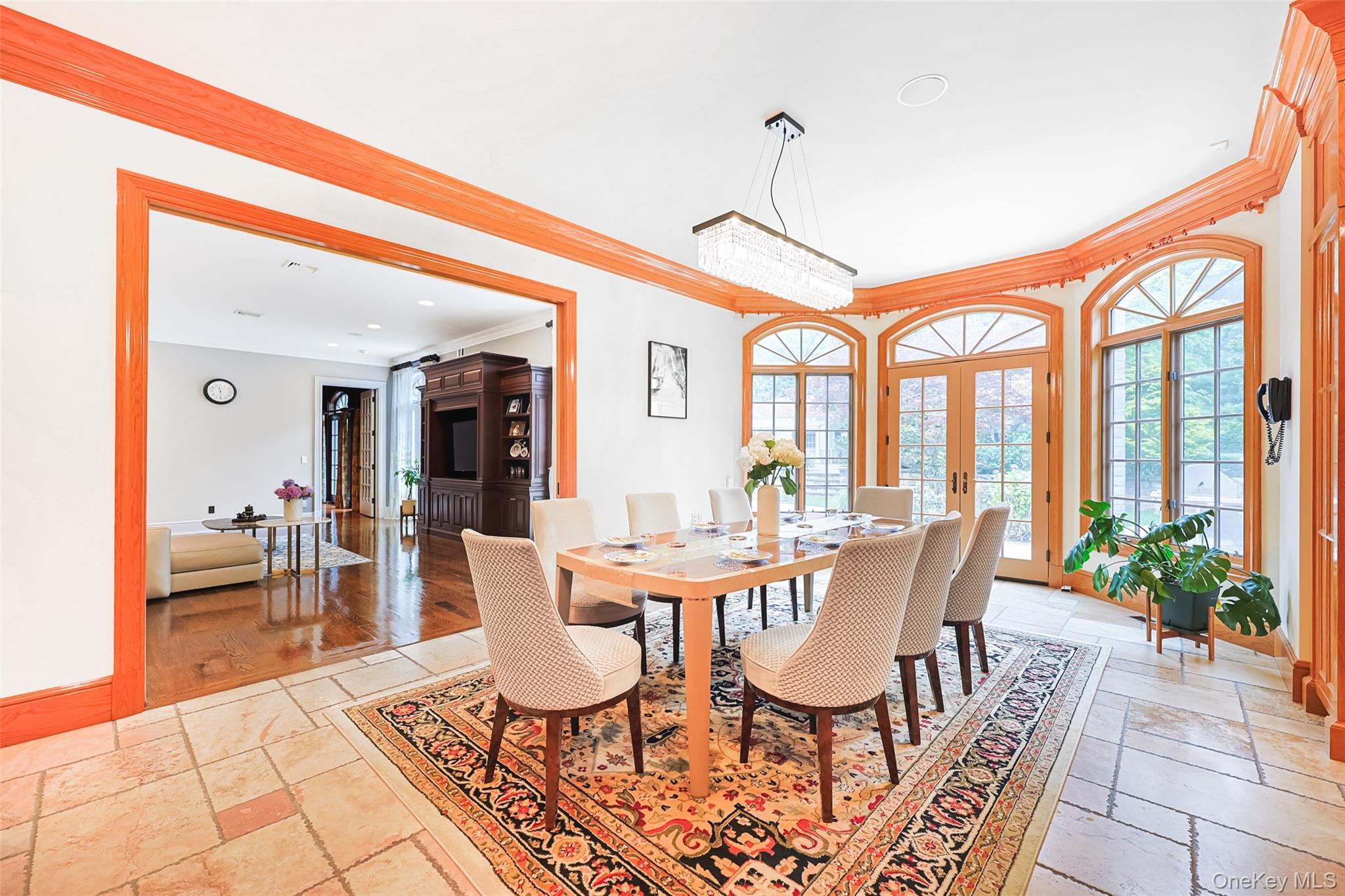 11 Black Rock Road Muttontown, NY 11545 - Photo 15 of 45 a dining room with furniture a chandelier and wooden floor