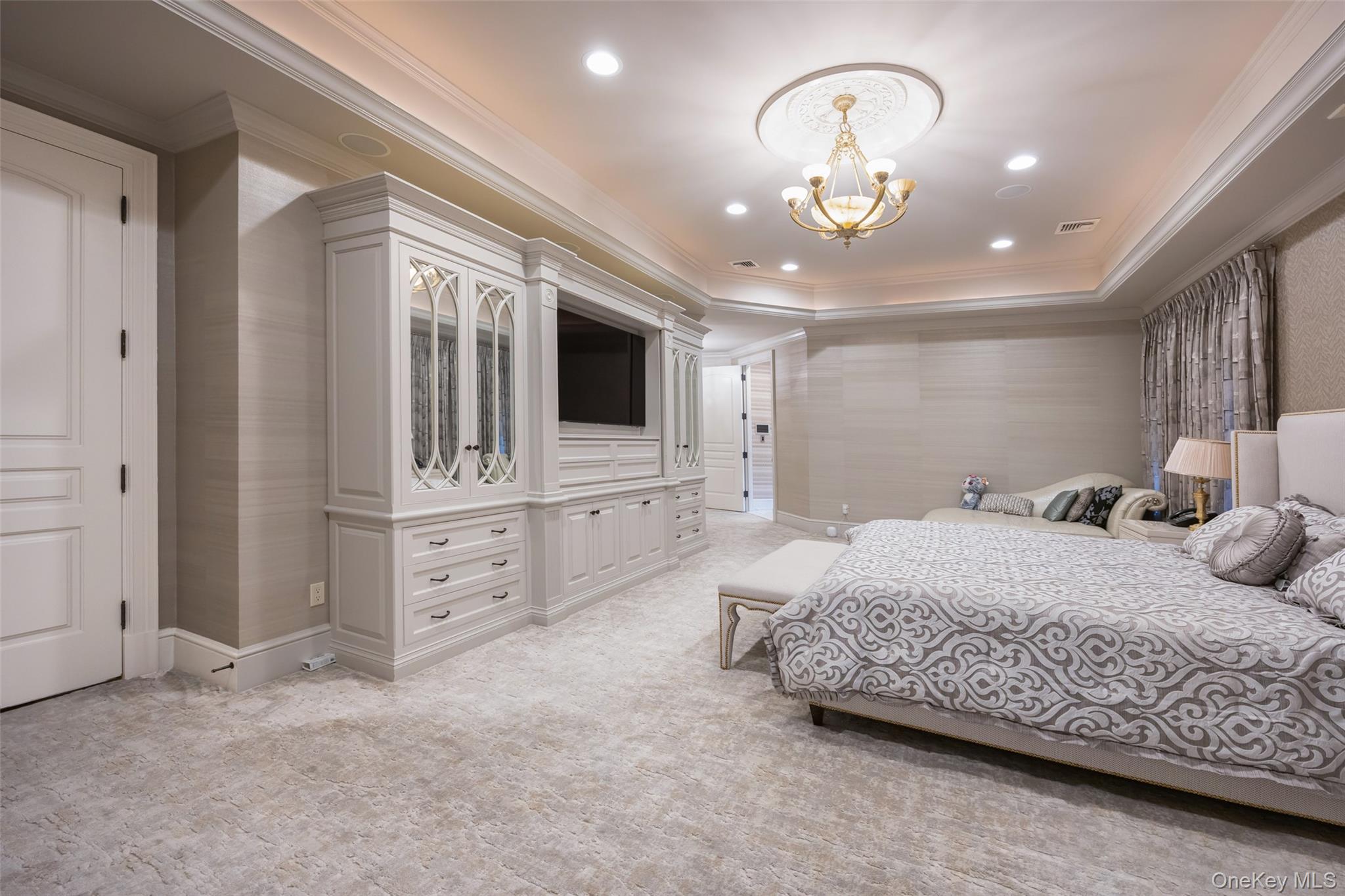 11 Black Rock Road Muttontown, NY 11545 - Photo 23 of 45 a spacious bedroom with a bed and ceiling fan