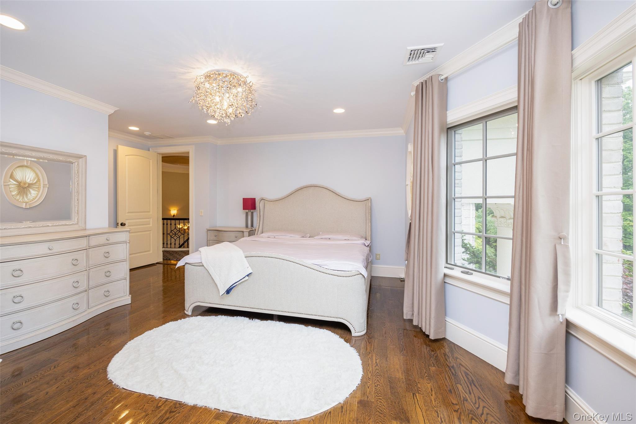 11 Black Rock Road Muttontown, NY 11545 - Photo 26 of 45 a bedroom with a bed and a table