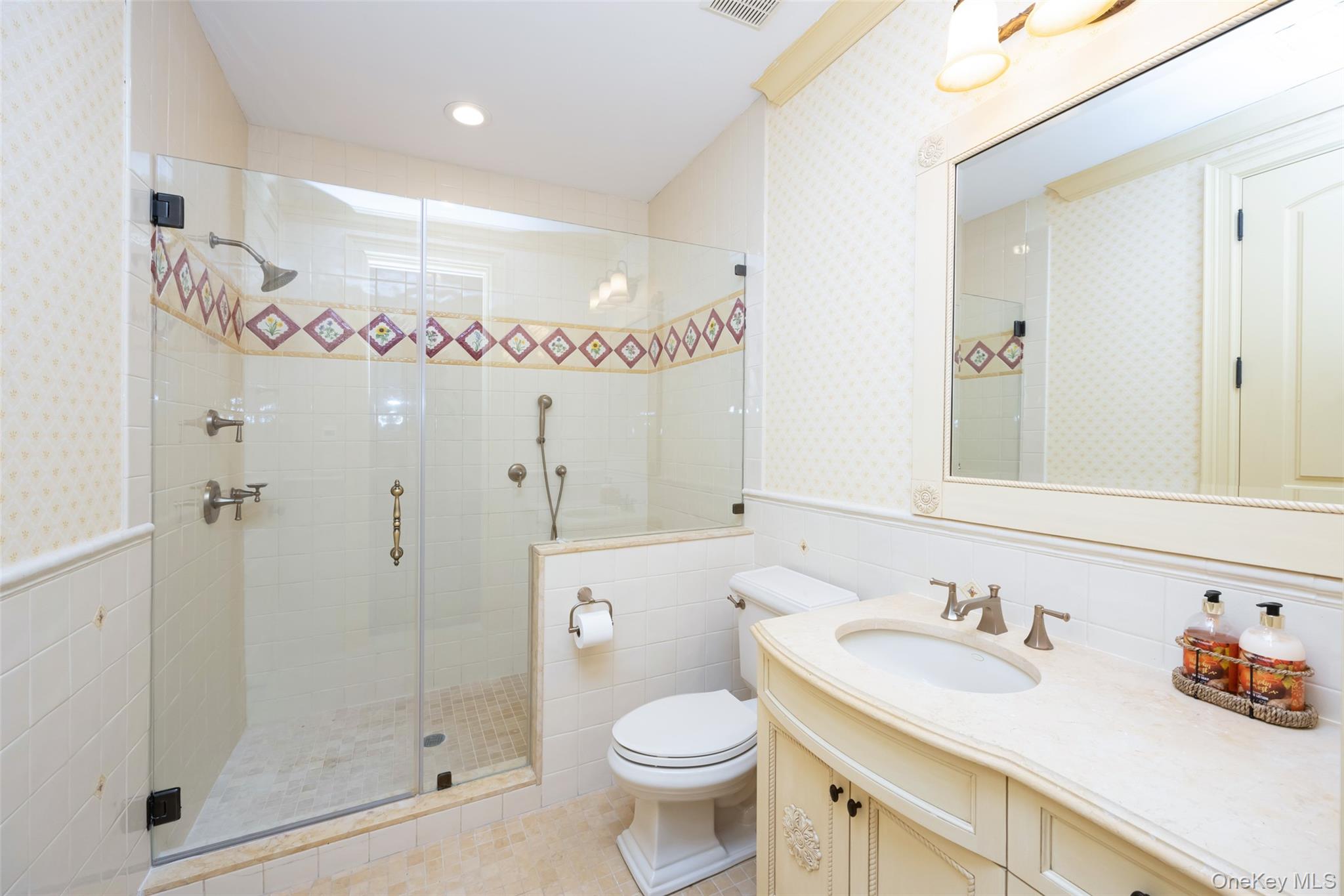 11 Black Rock Road Muttontown, NY 11545 - Photo 30 of 45 a bathroom with a sink a toilet and shower