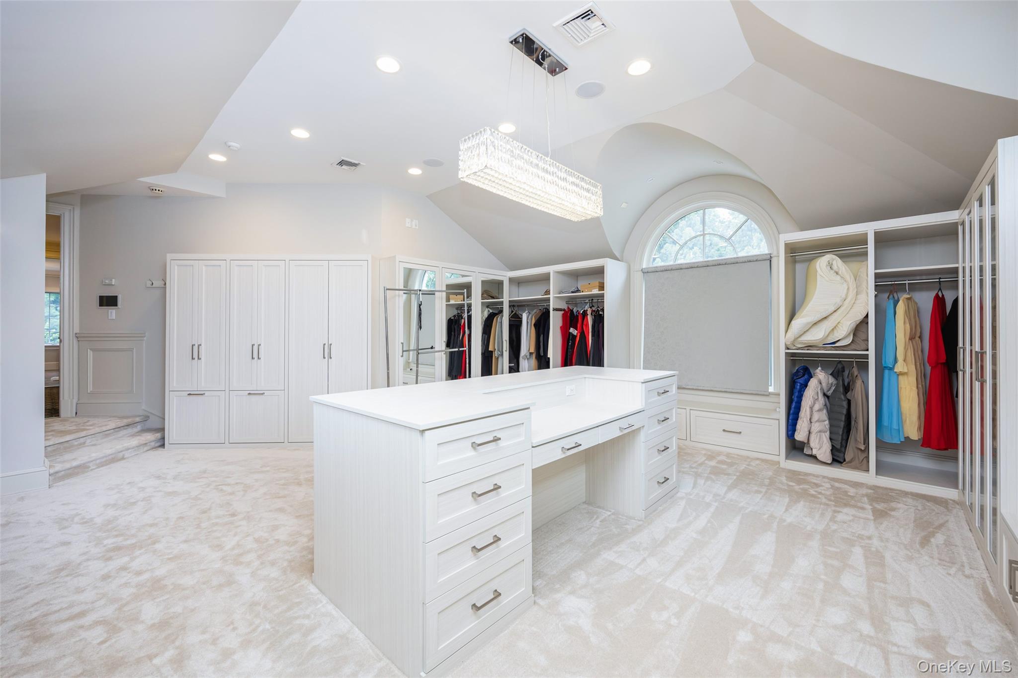 11 Black Rock Road Muttontown, NY 11545 - Photo 31 of 45 a large white kitchen with lots of counter space a sink a window and stainless steel appliances