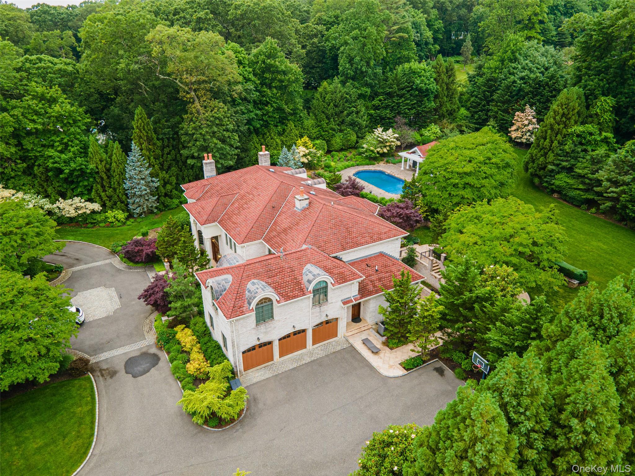 11 Black Rock Road Muttontown, NY 11545 - Photo 45 of 45 an aerial view of a house with a yard and greenery