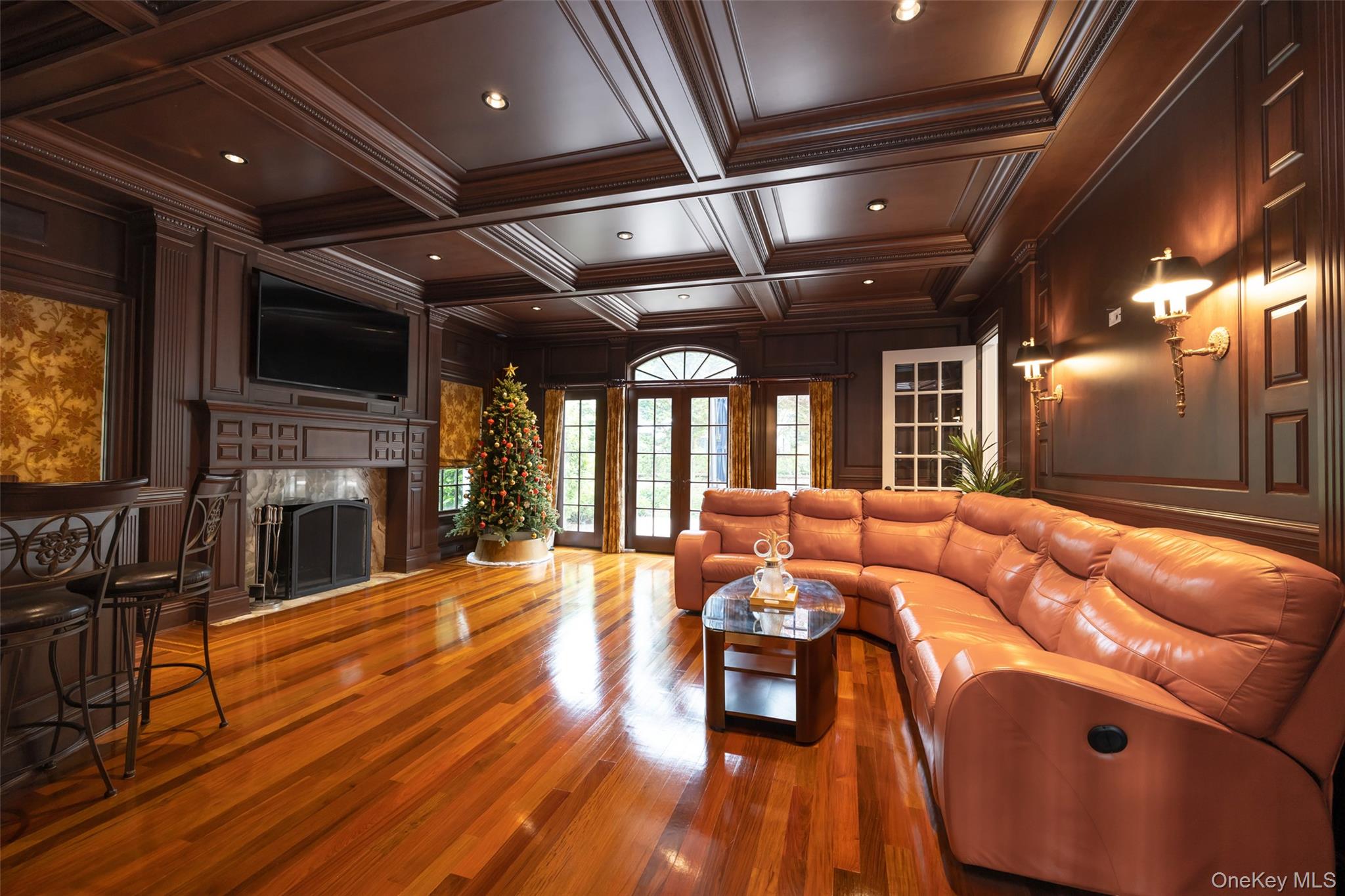 11 Black Rock Road Muttontown, NY 11545 - Photo 7 of 45 a living room with furniture a flat screen tv and floor to ceiling window