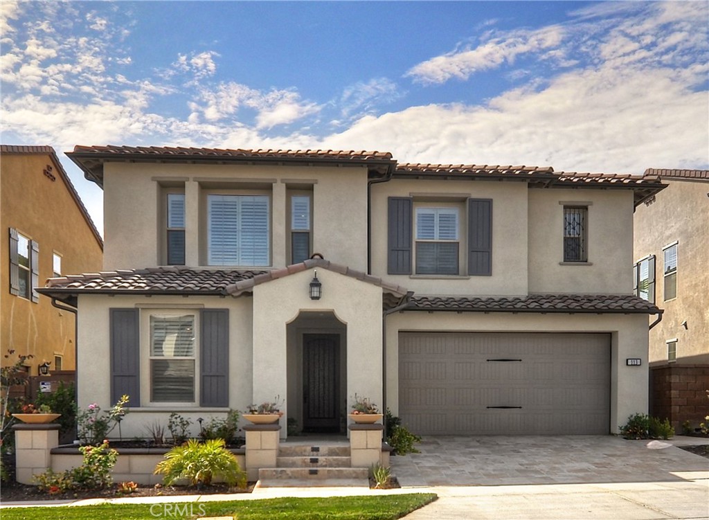 113 Briar Rose Irvine, CA 92618 - Photo 1 of 1 a front view of a house