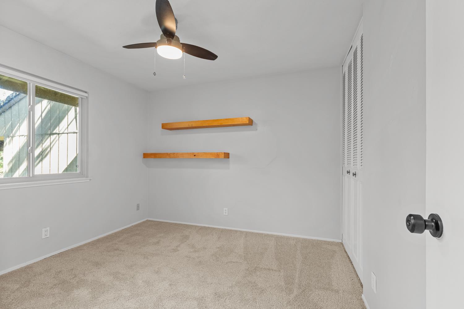 6909 Monticello Court Citrus Heights, CA 95621 - Photo 22 of 38 a view of an empty room with a window