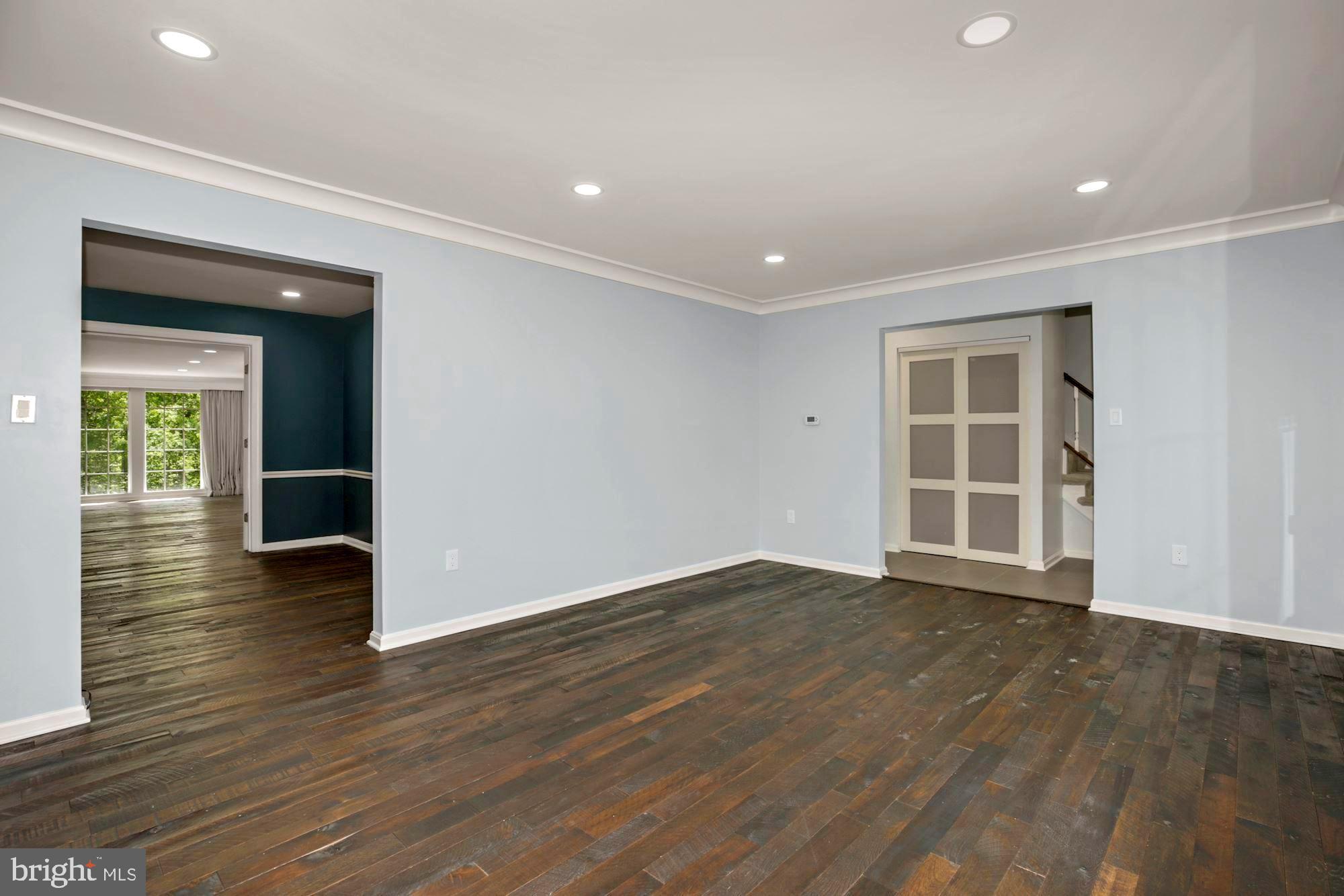 8111 West Point Drive Springfield, VA 22153 - Photo 5 of 46 a view of empty room with wooden floor