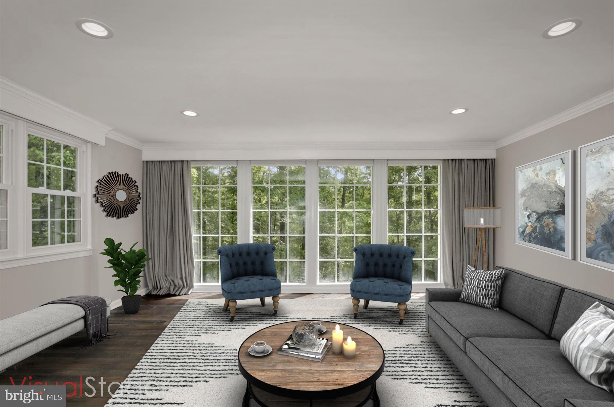 8111 West Point Drive Springfield, VA 22153 - Photo 10 of 46 a living room with furniture and a large window