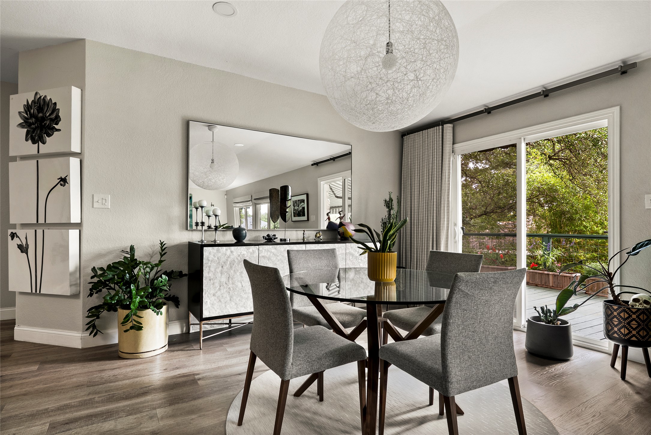 7021 Colberg Court Austin, TX 78749 - Photo 21 of 37 a view of a dining room with furniture window and wooden floor