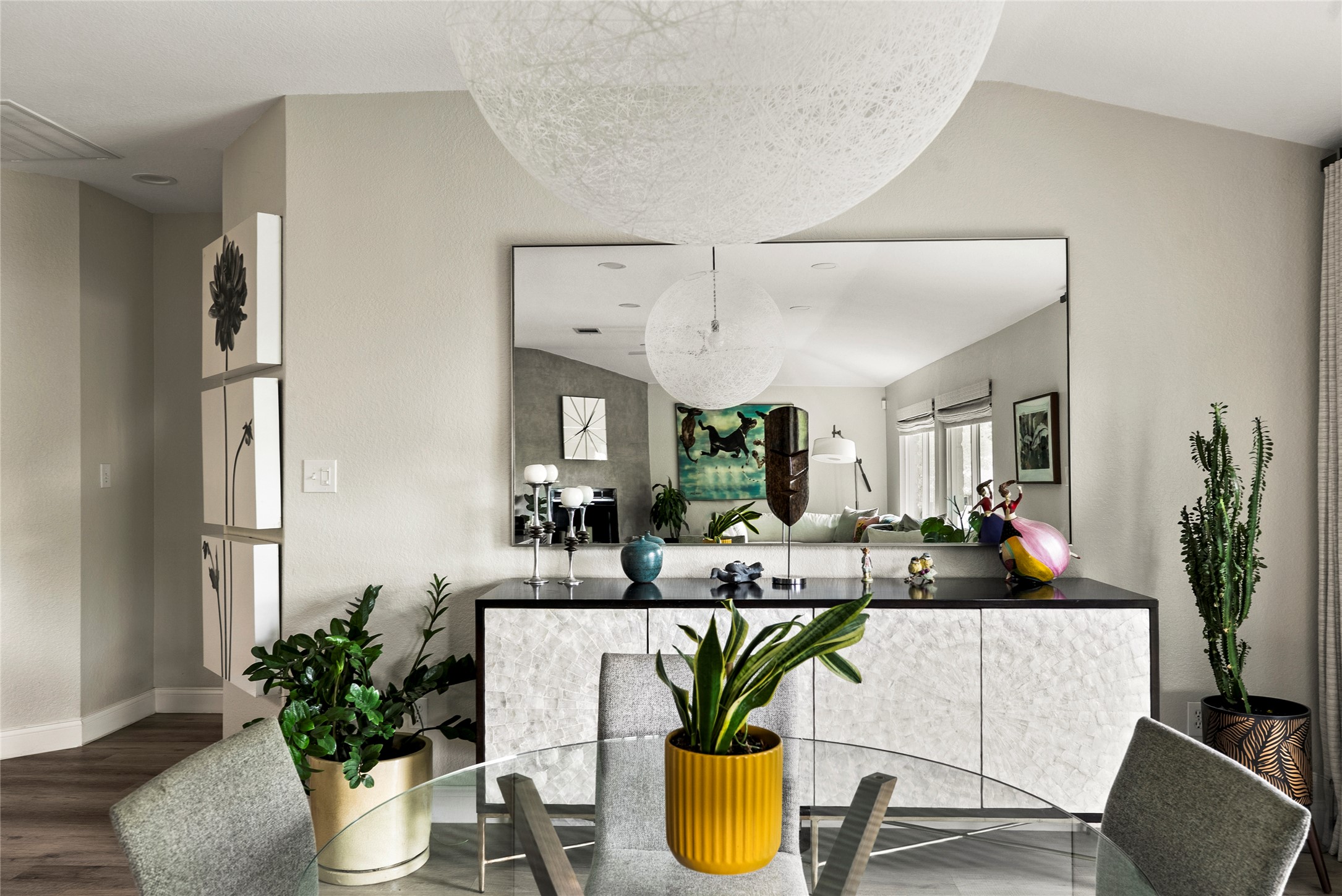 7021 Colberg Court Austin, TX 78749 - Photo 23 of 37 a living room with furniture a potted plant and a large mirror