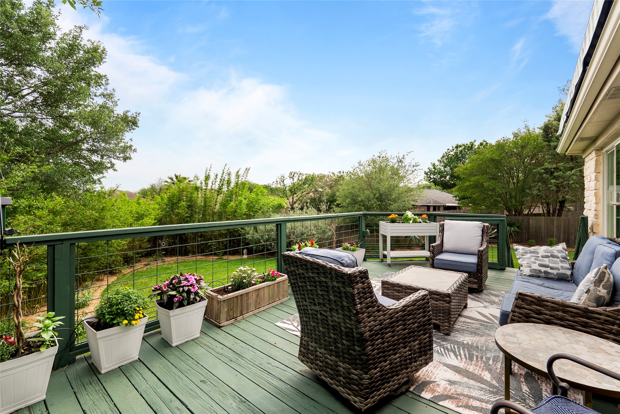 7021 Colberg Court Austin, TX 78749 - Photo 34 of 37 a view of a roof deck with a couches and potted plants