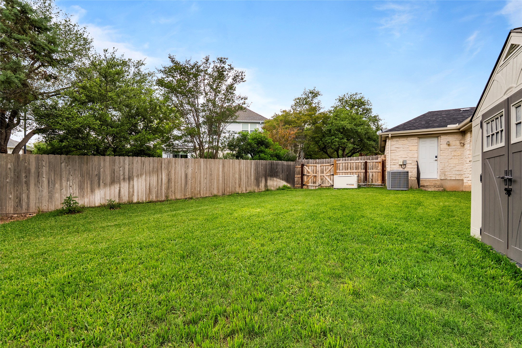 7021 Colberg Court Austin, TX 78749 - Photo 35 of 37 a view of a backyard with a garden