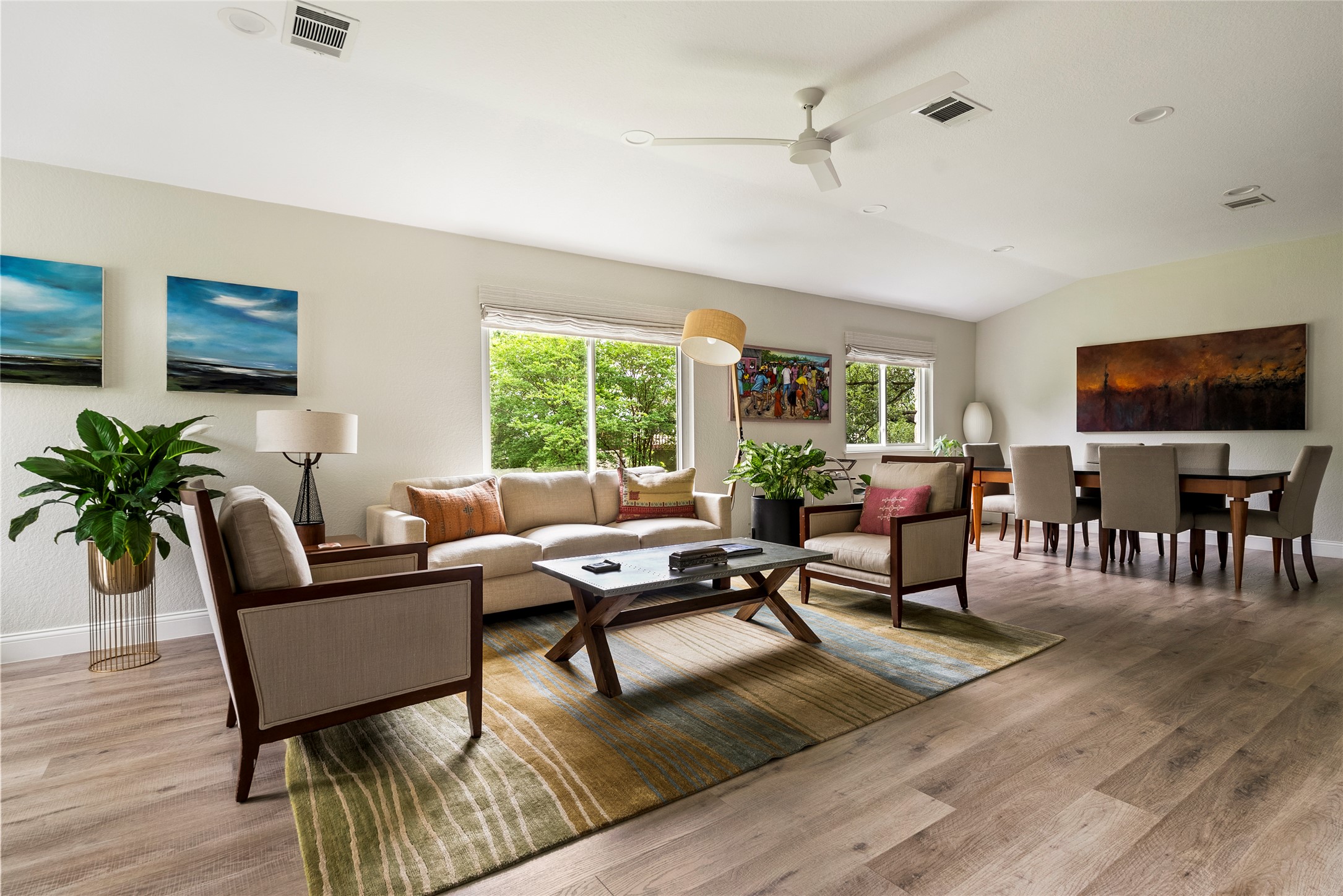 7021 Colberg Court Austin, TX 78749 - Photo 5 of 37 a living room with furniture and a flat screen tv with wooden floor