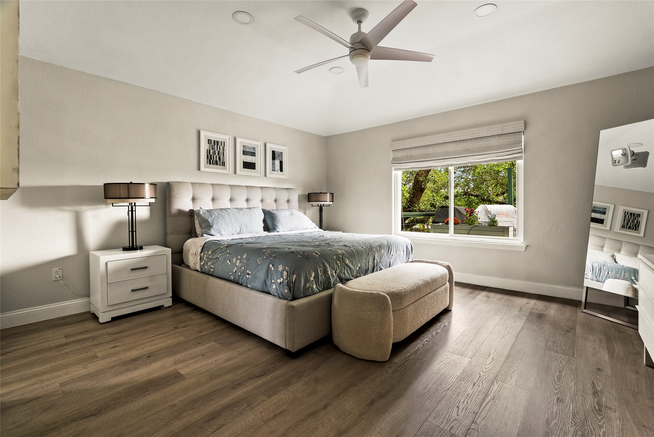 7021 Colberg Court Austin, TX 78749 - Photo 7 of 37 a bedroom with a large bed and a window