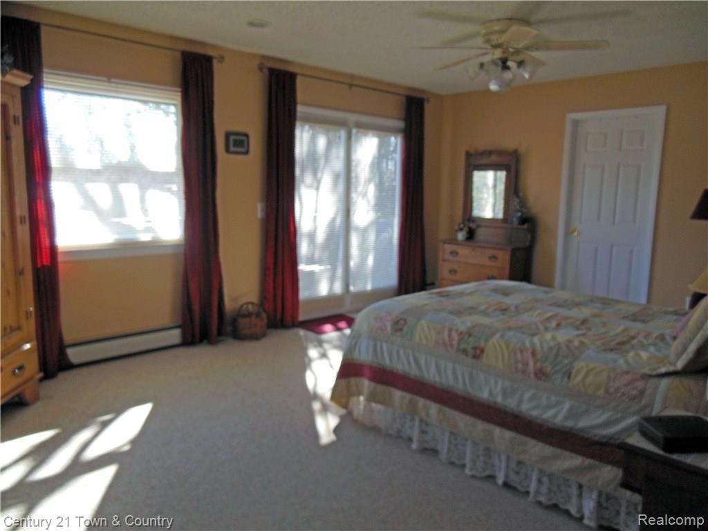 4801 Whipple Lake Road Clarkston, MI 48348 - Photo 8 of 25 MASTER BEDROOM WITH DUAL CLOSETS